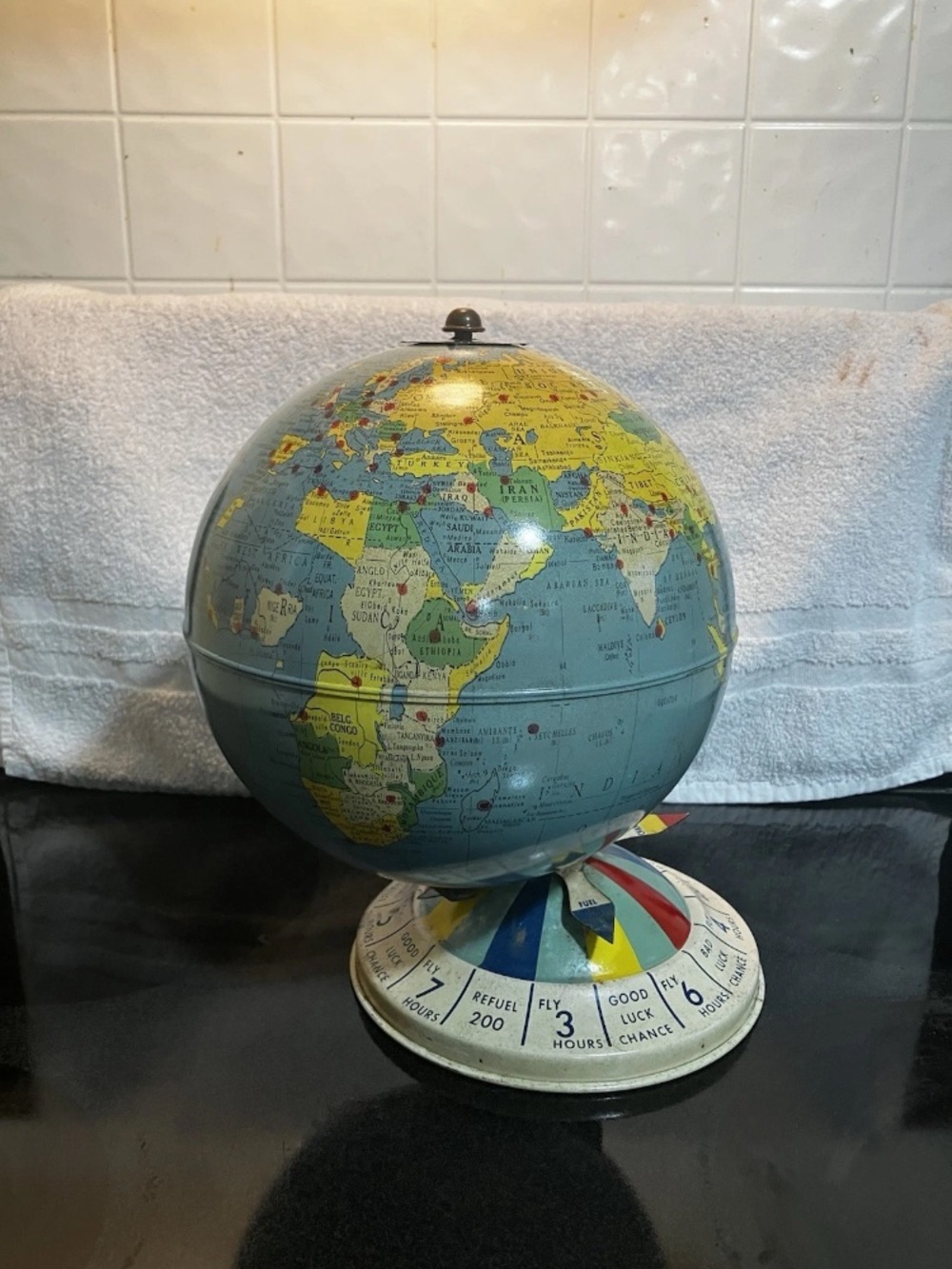 Vintage-Style Blue and Yellow World Globe with Colorful Base